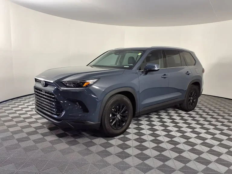2025 Toyota Grand Highlander Hybrid - front 3/4, exterior (1st gen 2024+, Hybrid XLE, clean studio background)
