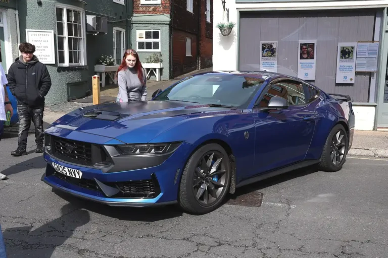 Ford Mustang Dark Horse vs Chevrolet Camaro ZL1 - Mustang Dark Horse (7th gen), blue, front 3/4 (1920 px, featured)