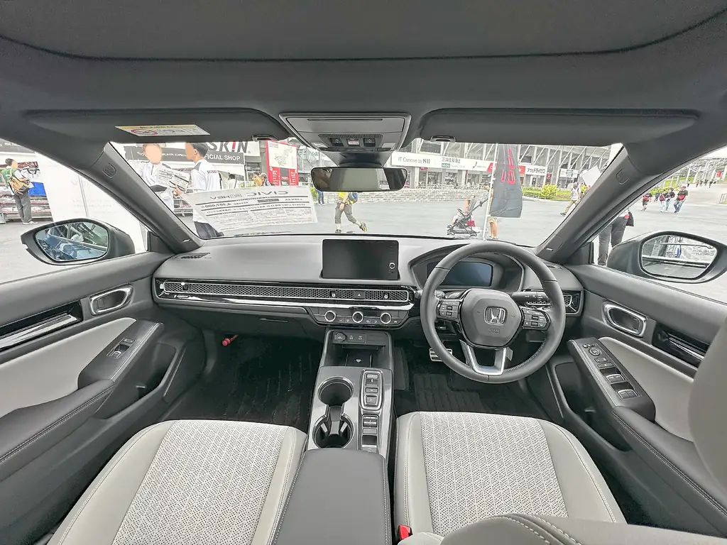 Honda Civic Hybrid (current 11th gen) (current model shown; 2027 redesign not yet photographed) - interior / dashboard (