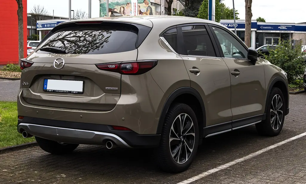 Mazda CX-5 Newground (KF facelift) - rear 3/4 exterior, second colour