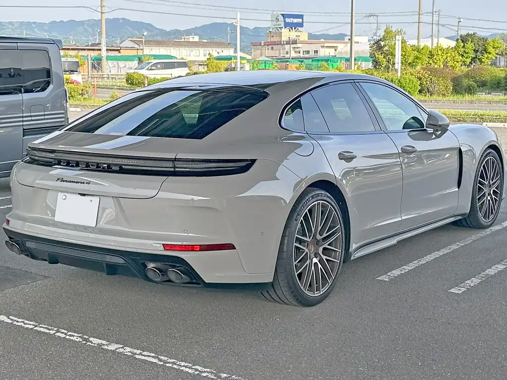 Porsche Panamera 4 (972) - rear 3/4 exterior