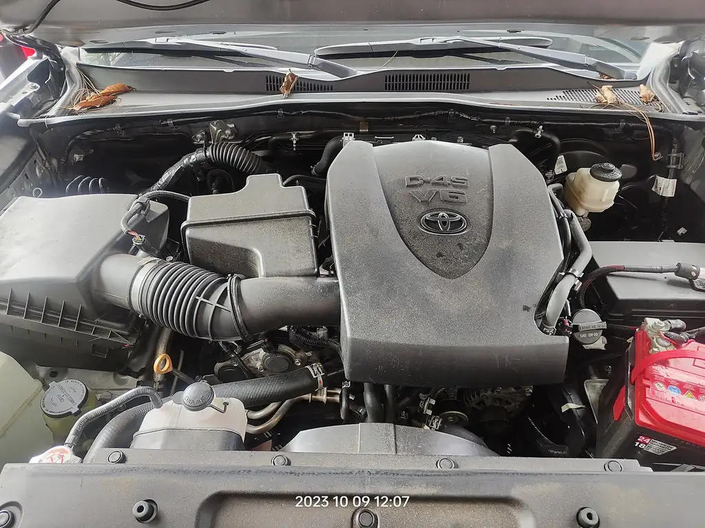 Toyota 2GR-FKS D-4S V6 engine bay with the ribbed air intake duct running from the air cleaner box