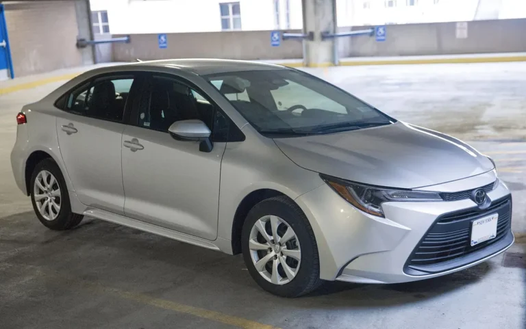 Toyota Corolla (E210, 2020-2024) - front 3/4, exterior (2024 Corolla LE sedan, E210 facelift)