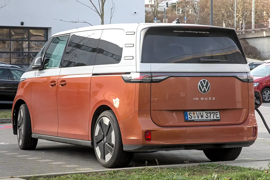 Volkswagen ID. Buzz - rear 3/4 exterior, orange/white